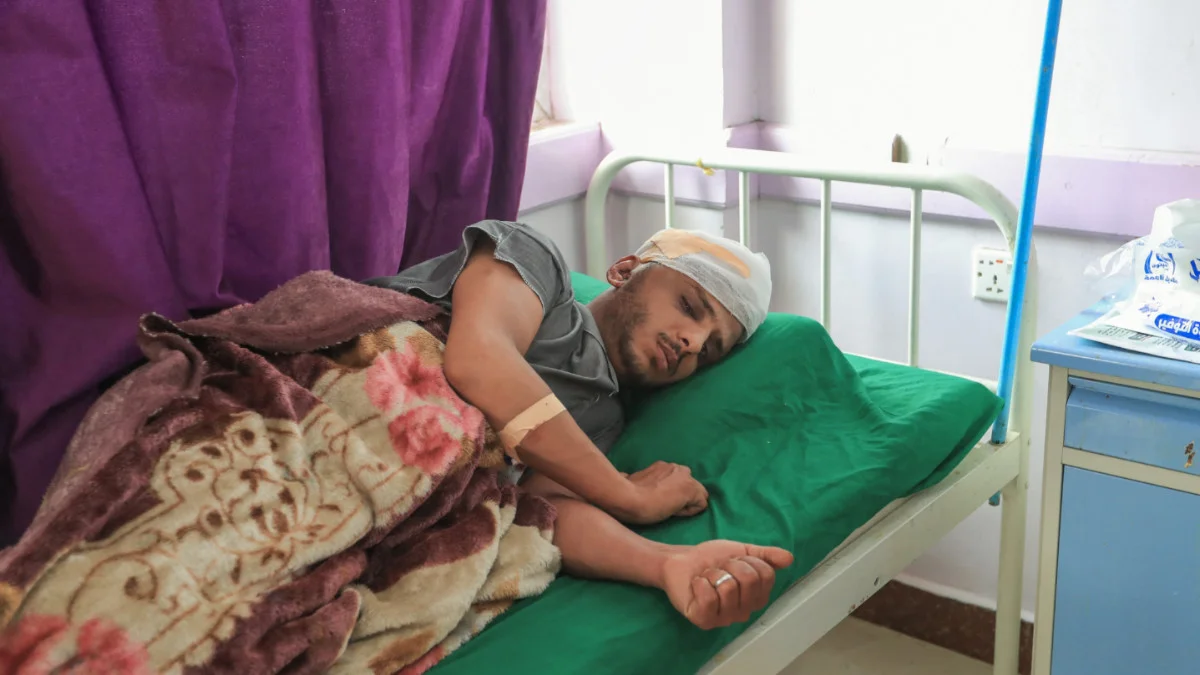 A Yemeni man who was injured in US air strikes receives treatment at Al-Jumhuri Hospital in Yemen's Houthi-held capital Sanaa, on 8 May 2025 (Mohammed Huwais/AFP)