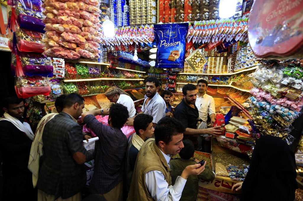 yemen eid sweets shopping ramadan afp