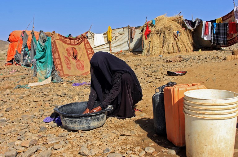 A Yemeni woman, displaced by fighting elsewhere in the country, in a camp for displaced people in Hajjah (AFP)&nbsp;