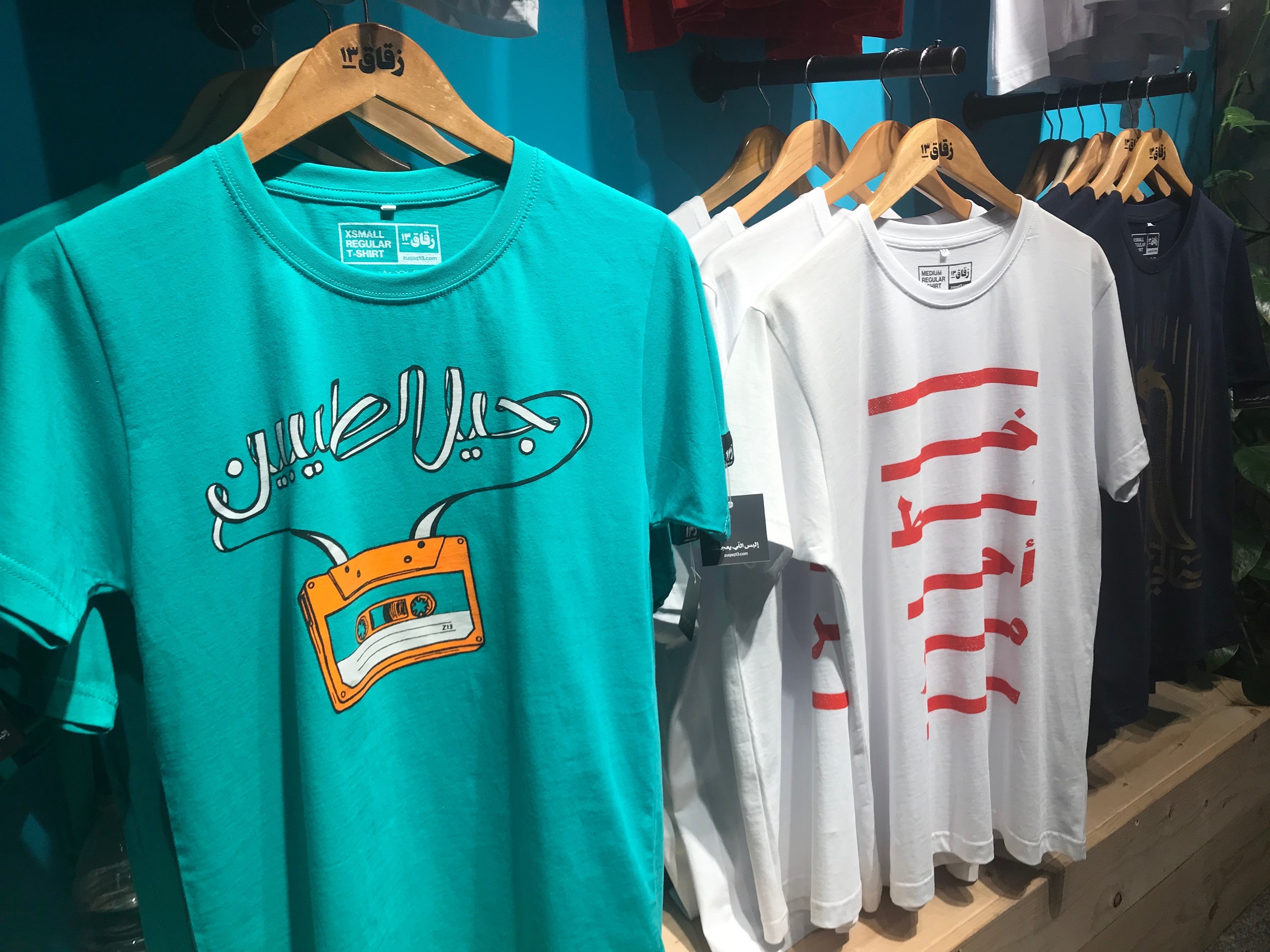 Des tee-shirts Zuqaq13, notamment le motif « bonne génération » (MEE/Lizzie Porter)